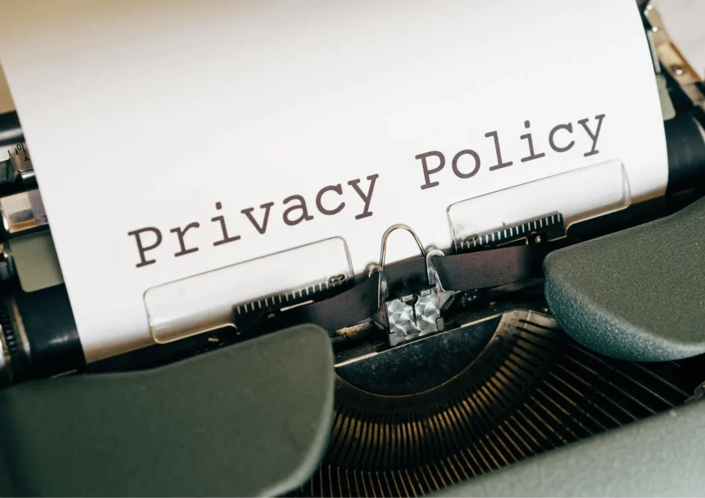 Privacy policy document typed on a vintage typewriter, symbolizing the evolution of data privacy practices.